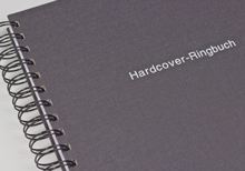 Hardcover-Ringbuch mit schwarzem Ring und weißer Prägung